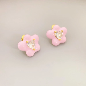 Pink enamel flower stud earrings with a heart-shaped zircon center and gold-plated finish
