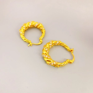 Twisted rope hoop earrings with gold plating and sparkling zircon pavé setting