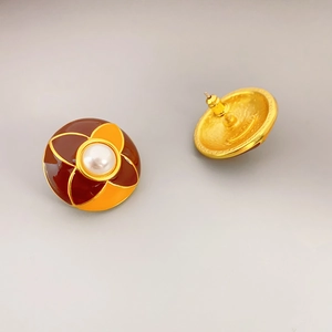 Elegant gold-plated enamel round stud earrings with pearl center and floral pattern