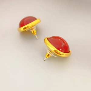 Retro style red gemstone earrings set in gold plated round frames, 925 silver needle