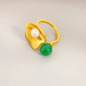 Artistic gold ring with Mabe pearl and green chalcedony lotus leaf design