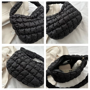 Detailed views of a black quilted puffer bag showing large capacity and soft texture