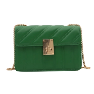 Green quilted PU leather crossbody bag with gold chain strap and turn-lock closure
