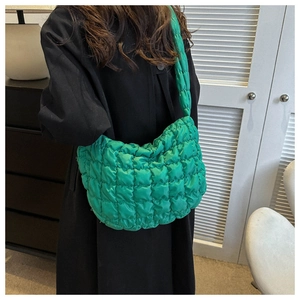 Bright green quilted nylon hobo bag featuring a lightweight puffy design and large capacity