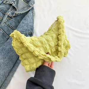 Minimalist lemon green bubble fabric shoulder bag with unique pleated texture and top zipper