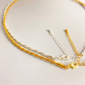 Sleek twisted rope chain necklaces in gold and silver finish with lobster clasp