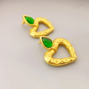 Vintage French heart earrings with gold plating and green pear-cut gemstones