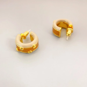 Fashion C-shaped gold earrings with beige and orange enamel and bullet backings
