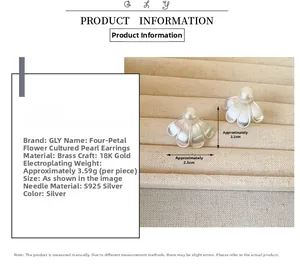 Detail of four-petal brushed silver stud earrings with a central white freshwater pearl