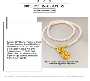 Detail of pearl necklace with 18K gold-plated camellia pendant and crystal inlay