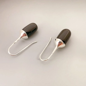 French retro silver earrings with oval agate pendants in a minimalist hook style