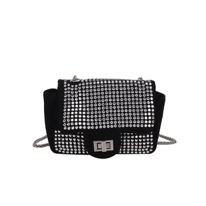 Chic black rhinestone studded crossbody chain bag with silver buckle and glam style