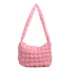 Pink quilted bubble puffy shoulder bag made of lightweight nylon with a cloud texture