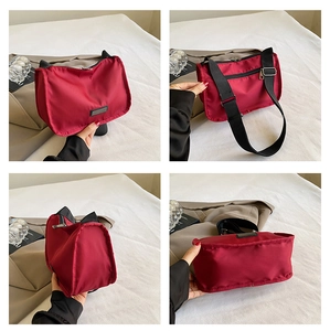 Detail view of red nylon crossbody bag showing multiple angles and back zipper pocket