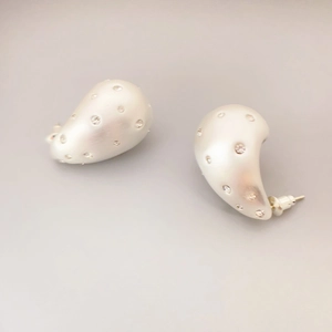 Brushed silver teardrop earrings with sparkling crystals for a sophisticated look