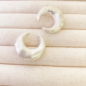 French vintage crescent-shaped silver stud earrings with a brushed metallic matte finish