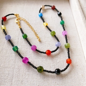 Colorful beaded choker necklace with faceted natural stones and gold lobster clasp