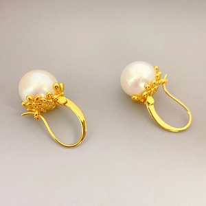 Elegant 18K gold plated brass drop earrings featuring large white Mabe pearls and floral base