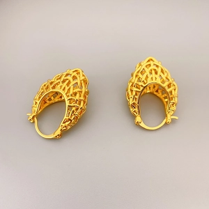Chic 18K gold plated hollow woven hoop earrings with intricate braided texture