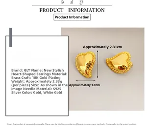 Detailed view of heart-shaped 18K gold earrings with S925 silver pins and exact dimensions