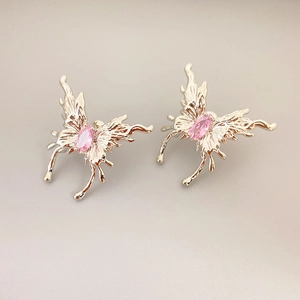 Minimalist silver butterfly earrings with pink marquise gemstone in liquid metal design