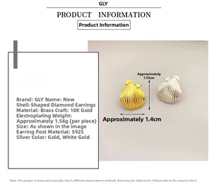 Detail of shell earrings in 18K gold plating with S925 silver pin and crystal inlay