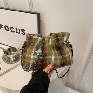 Plaid wool bucket bag with silver chain strap and metallic ball drawstring closure