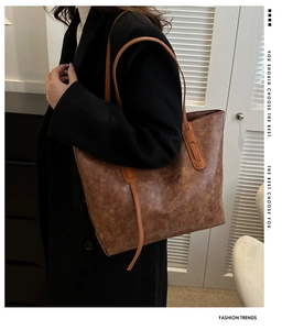 Macro detail of retro brown tote bag texture and high-quality vintage leather finish