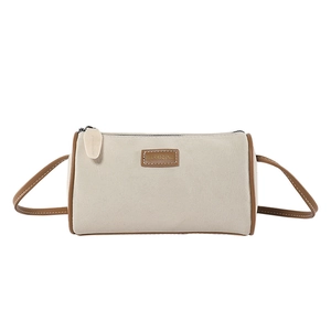 Borsa a cilindro retrò in finta pelle scamosciata crema con bordo marrone e zip in alto