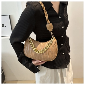 Fashionable brown pleated underarm bag with gold chain and woven shoulder strap for women