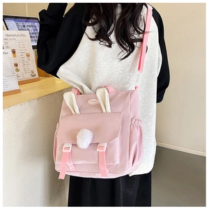 Pink rabbit-themed backpack and shoulder bag with cute bunny ears for teen girls