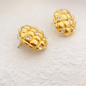 Golden pineapple earring with diamond accents and luxury quilted pattern design