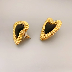 French vintage style heart studs with black resin inlay and gold textured metal frame