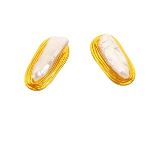 Vintage baroque pearl stud earrings with gold spiral textured metal base in white background
