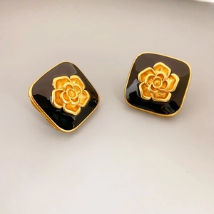 Vintage gold and black enamel camellia stud earrings in a square frame for women