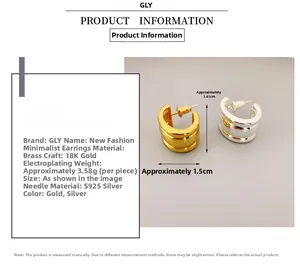 Detail of 18K gold and silver plated C-shaped brass earrings with S925 silver pins