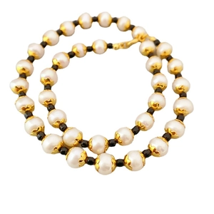 Elegant freshwater pearl necklace with gold floral metal spacers and black bead accents