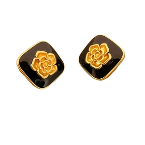 Retro black enamel camellia earrings with gold flower detail on 925 silver studs