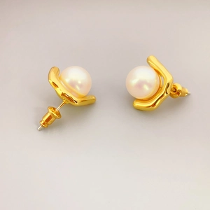 Elegant 925 silver needle pearl stud earrings with a minimalist golden U-shaped design