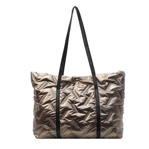 Champagne gold quilted down tote bag with metallic finish and long black leather straps
