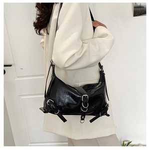 Retro black wrinkled patent leather crossbody bag with silver buckle strap details