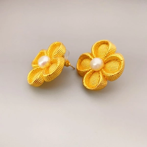 Elegant 18K gold plated clover earrings featuring textured metal and central white pearl