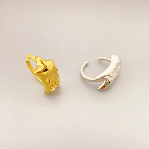 Star shaped 18K gold and silver plated brass ear cuffs with small sparkling crystals