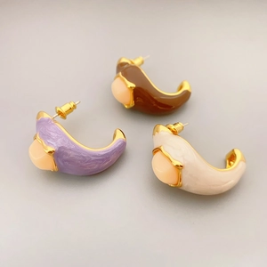 Chic C-shaped enamel earrings with inset gemstones in lavender, brown, and cream white colors