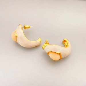 Vintage gold C-shaped earrings with marble enamel inlay and apricot stone center