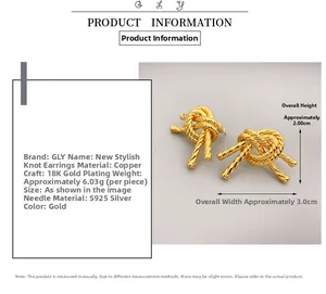 Macro view of golden knot earrings with detailed product size and material specs