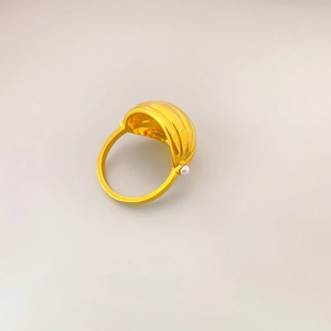 French Hera light golden nut-shaped ring with pearl accents and polished metallic finish