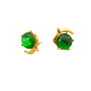 Elegant gold twig earrings featuring round green glass stones on a minimalist white background