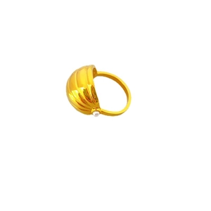 Elegant gold nutmeg shell ring with parallel textures and white pearl accent