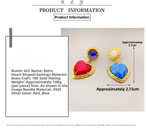 Detailed specs of vintage heart earrings with glazed stones and S925 silver needles